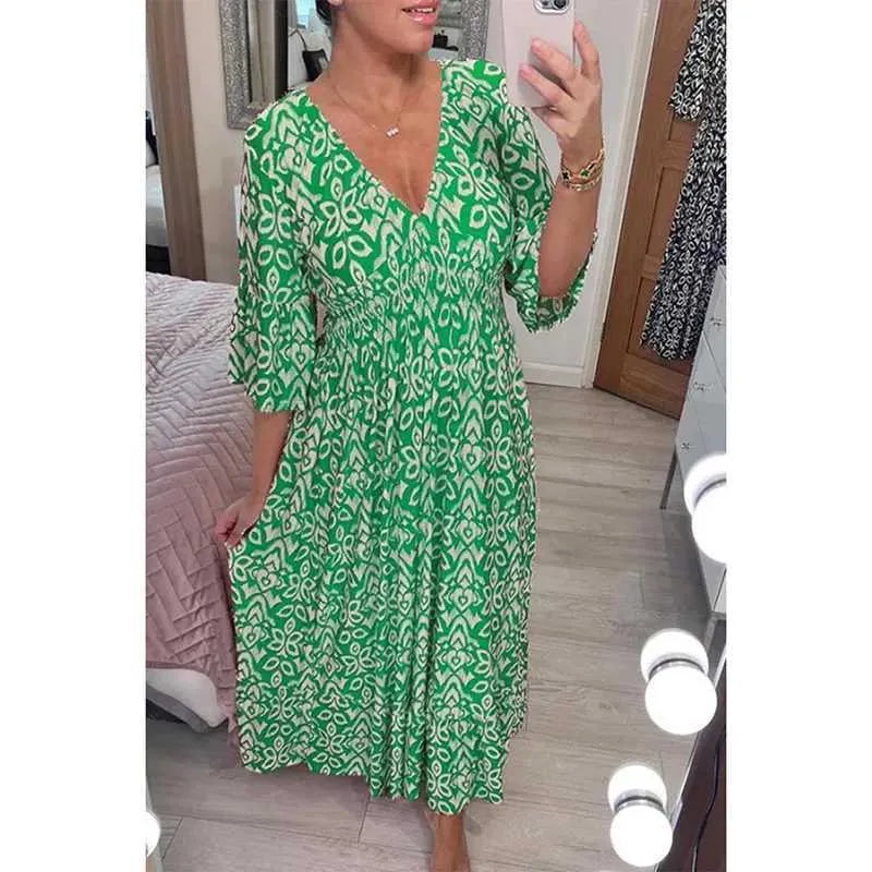Robe mi-longue imprimée à taille haute et col en V Adelie