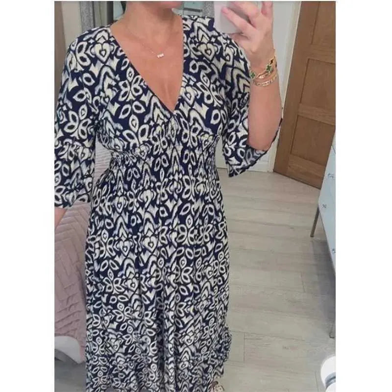 Robe mi-longue imprimée à taille haute et col en V Adelie